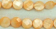 Design 5811: Orange shell coin, faceted beads