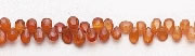 Design 6581: orange garnet briolettes, tear-drop beads