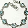 Design 5556: blue blue topaz engagement bracelets