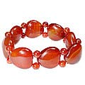 7494: Beaded orange,red chalcedony stretch bracelets