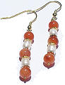 1386: Beaded orange,white carnelian earrings