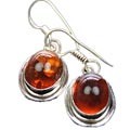 7932: Silver Setting Orange amber earrings