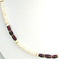 570: Beaded red,white garnet  strand necklaces