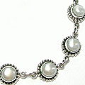 Design 6905: white pearl necklaces