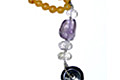 7943: Beaded Yellow, Purple multi-stone  donut necklaces