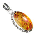 1256: Silver Setting brown,orange amber pendants