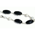 Design 11103: black,white onyx bracelets
