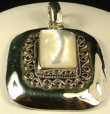 SKU 712 - a Silver Pendants Jewelry Design image