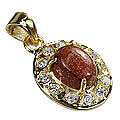 9946: Silver Setting Rust goldstone pendants