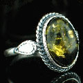 12511: Silver Setting green amber rings
