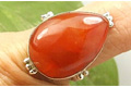 7227: orange carnelian  drop rings